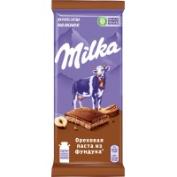 Шоколад молочный MILKA с дробленым орехом, пастой из фундука и с дробленым фундуком, 85г