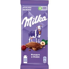 Купить Шоколад молочный MILKA с дробленым фундуком и изюмом, 85г в Ленте