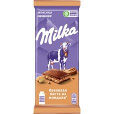 Купить Шоколад молочный MILKA с добавлением ореховой пасты и с дробленым карамелизированным миндалем, 85г в Ленте