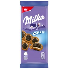 Купить Шоколад молочный MILKA Oreo с круглым печеньем и начинкой со вкусом ванили, 92г, Венгрия, 92 г в Ленте